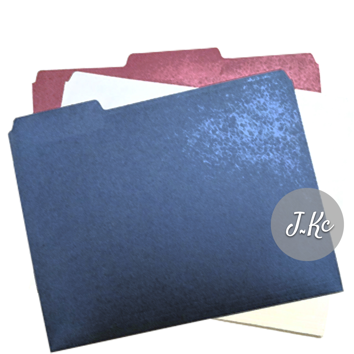 Red, white, and blue office folders used to organize projects.
